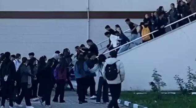 They stormed the school with sticks and beat the student.