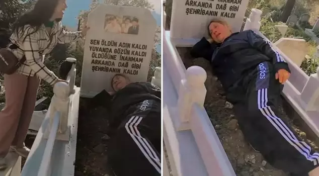 He lay on the ground above his wife's grave and cried uncontrollably.