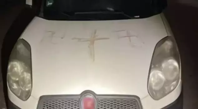 They drew swastikas in human blood on the cars.