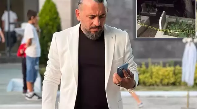 The famous businessman was found dead hanging in the cemetery.