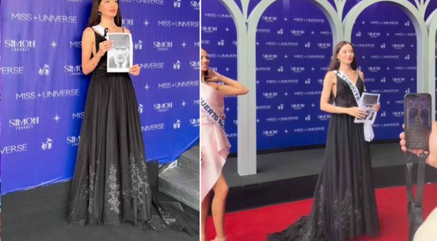 Miss Universe Turkey Ceren Arslan donned black attire and walked with a portrait of Atatürk.