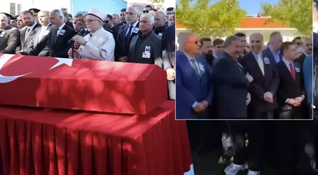 The identities of the smiling names at the head of the martyr's coffin have been revealed.