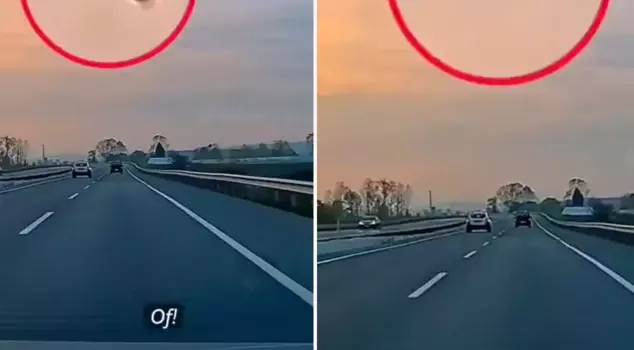 A bullet struck a moving vehicle in traffic.