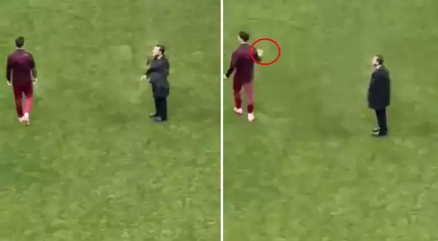 A striking moment between Günay Güvenç and Okan Buruk after the match.