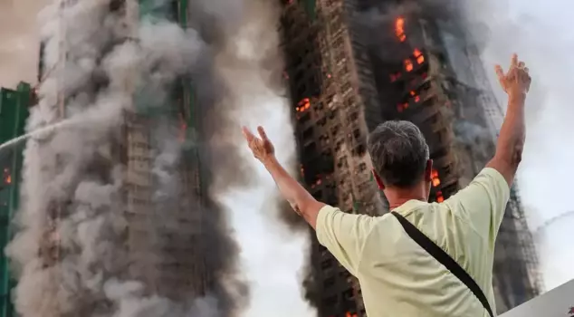 In the fire at the large complex where 4,000 people live, the death toll has risen to 94.