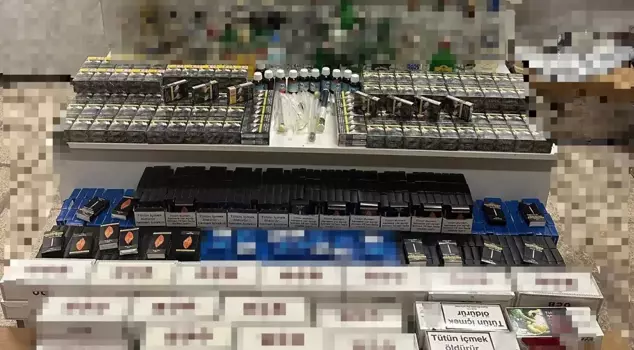 The house where the young woman was found dead was determined to contain counterfeit alcohol.