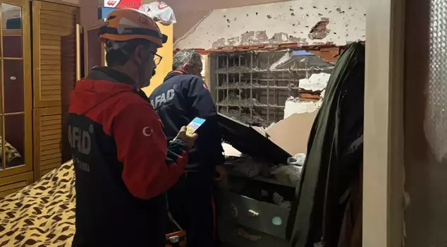 The ground really shook! When he woke up, he learned that his bedroom had collapsed.