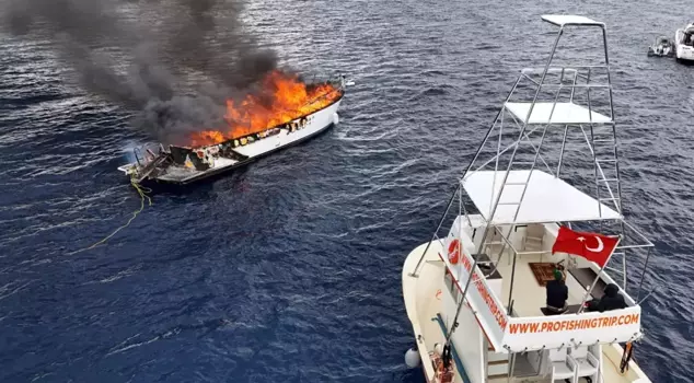 The moments when the luxury yacht was engulfed in flames off the coast of Kalkan were captured by a drone.