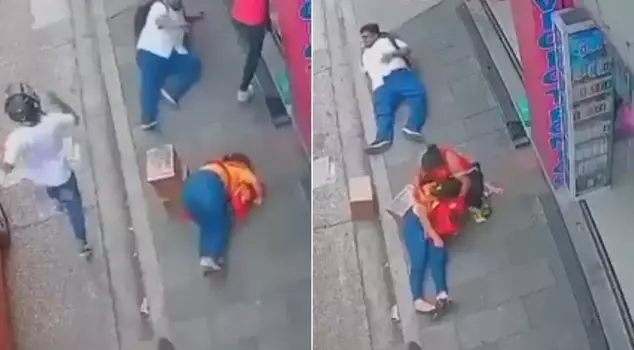 In the midst of the conflict, a desperate situation! A mother was shot while holding her baby in her arms.