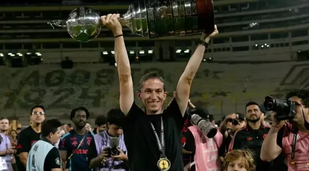 Filipe Luis won a total of five trophies in one year.