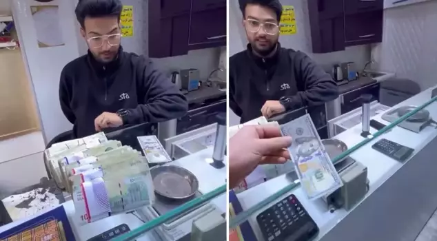 The economic situation in the neighbor country is dire: He went to the currency exchange to get 100 dollars, but...