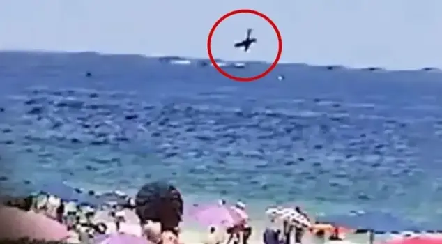 Terrible accident! It crashed right in front of the sunbathers on the beach.