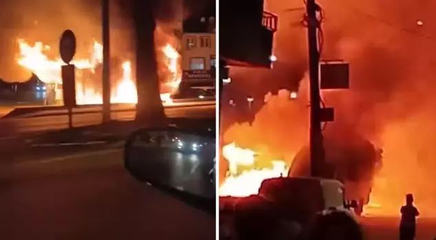 اندلعت النيران في الكوخ وانتقلت إلى الحافلة الصغيرة المركونة والمركبة التجارية الخفيفة.