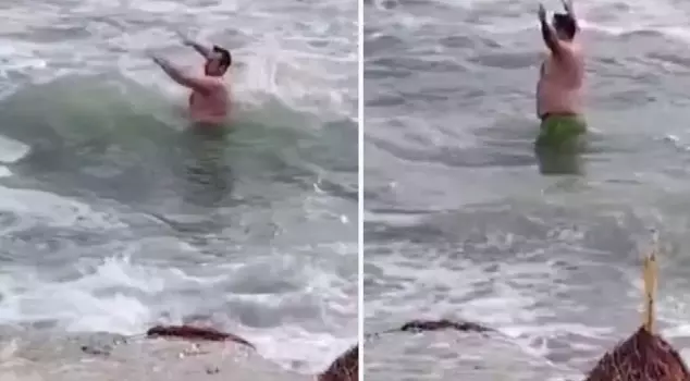 В Силиври гражданин, не обращая внимания на холодную погоду и шквалистый ветер, вошел в море.