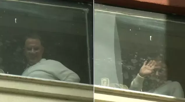 Murat Çalık, who is going to lie on the operating table, waved from the hospital window.