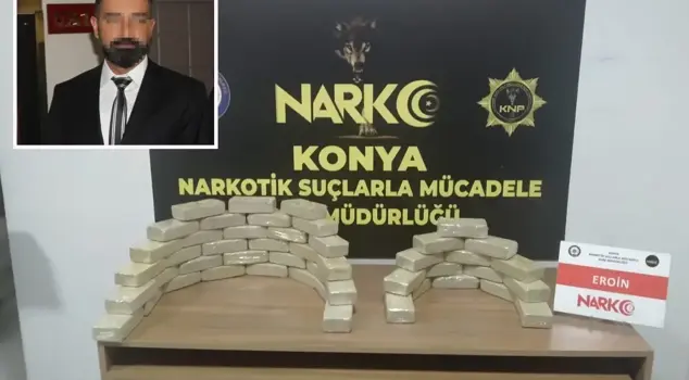 Award-winning narcotics officer sentenced to 26 years in prison for heroin trafficking.