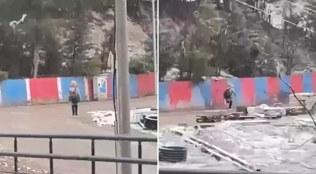 The little ones, who captivated hearts while standing in respect for the National Anthem during the snowfall, touched everyone.