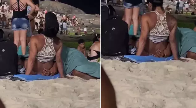 Inappropriate images in front of children on the beach.