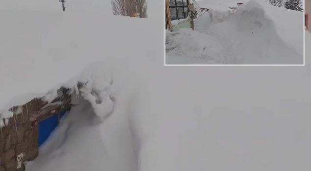 Neither Kamchatka nor Alaska! It snowed as high as the building.