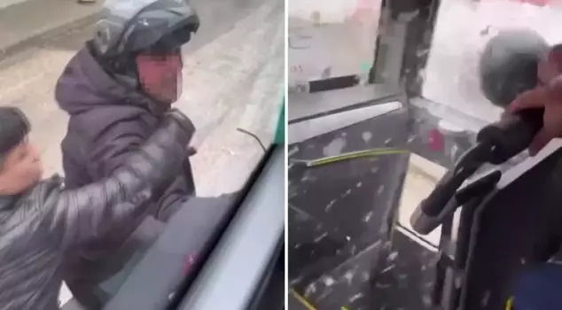 He broke the window of the service vehicle he was arguing with in traffic using his helmet.