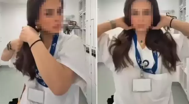 Another nurse supported the DEM Party's action! The necklace around her neck caught attention.