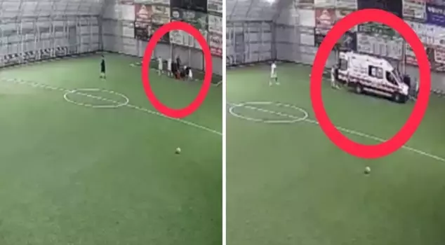 Moments when the teacher who suffered a heart attack on the turf field collapsed were captured on camera.