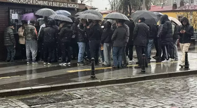 They don't care about the rain or mud! They are waiting in line for the excitement on February 14th.