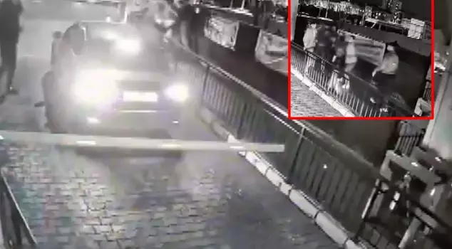 A police officer and his wife were assaulted in the middle of the street.