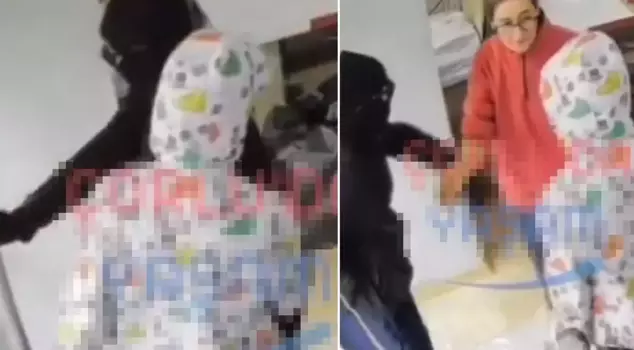 The female shopkeeper cursed and slapped the two people who came to rob her.