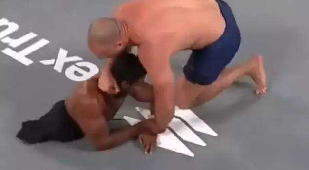 He choked his opponent, who had no legs, into submission.