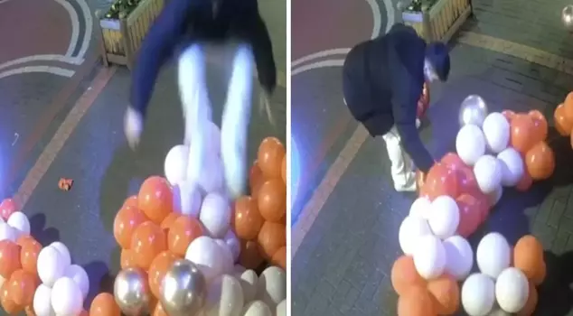 The Valentine's Day balloon was popped, and he was taken into custody! Those moments were captured on camera.