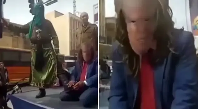 A scene to anger Trump in Iran: They brought him on stage and beheaded him.