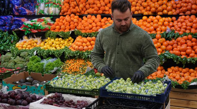 He sells the green plums he bought from Turkey for 500 dollars per kilogram in his country.