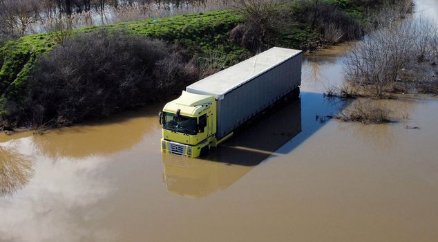 The truck driver who was stranded in floodwaters for three days has been rescued.