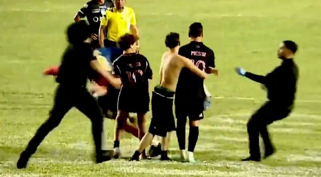A fan who entered the field knocked Messi to the ground.