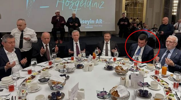 Everyone is on the phone with Osman Gökçek during the iftar prayer.