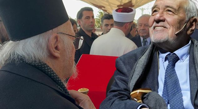 Ecumenical Patriarch Bartholomew prayed at the head of Ortaylı's coffin.