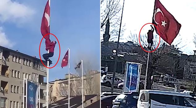 He climbed the 15-meter pole to straighten the flag fluttering in the wind.