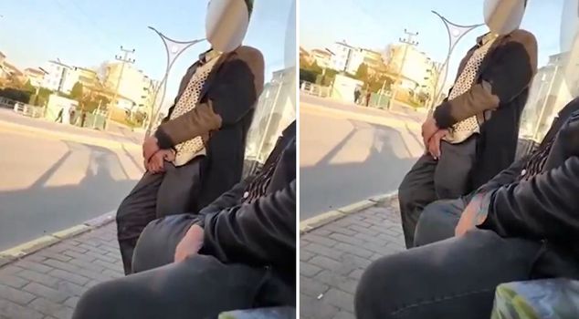 Pervert camera at the bus stop.