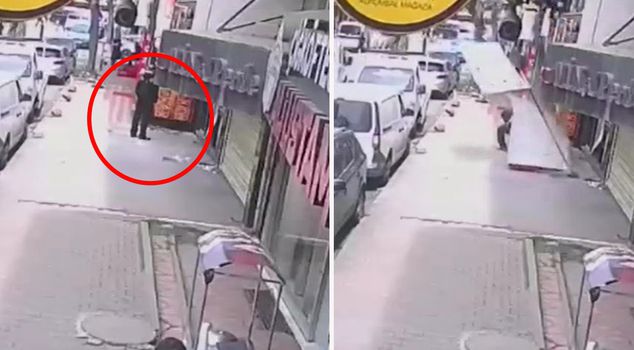 The sign he was trying to put up in Gaziosmanpaşa fell on the person waiting on the sidewalk.
