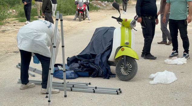 Bloody execution on a motorcycle