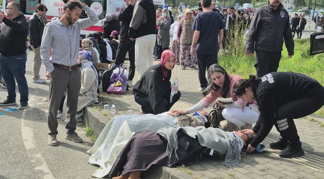 Public bus overturned onto car: 44 injured