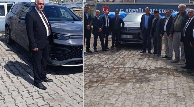 'Official vehicle' pose in front of the municipal building
