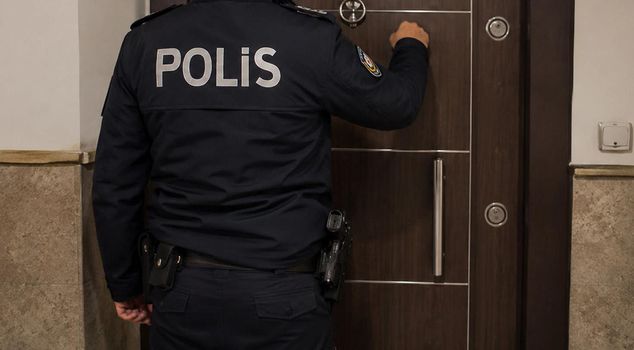 The police officer attempted to rape the young woman at the house he raided.