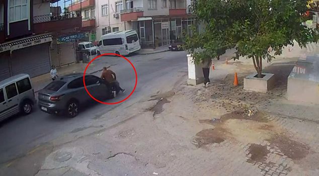 While waving at someone nearby, he was hit by a car as he set off onto the road.