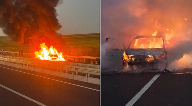 Car in motion engulfed in flames