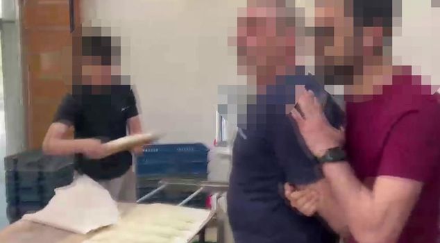 A fugitive wanted for 8 separate crimes and facing 24 years in prison was caught in a bakery.