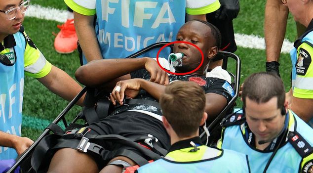 What the green object in the mouth of the football player with a broken leg turned out to be