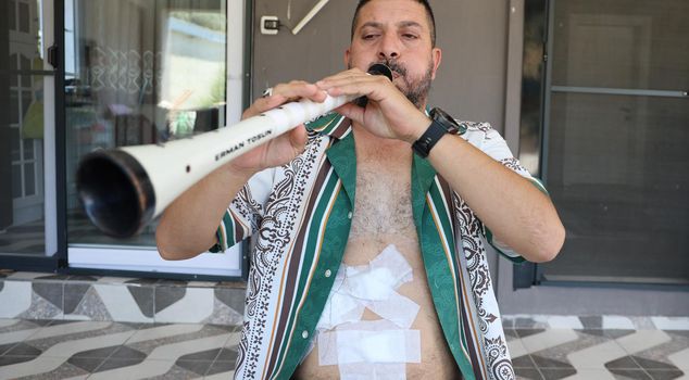 He came out of surgery and did his breathing exercise with a zurna.
