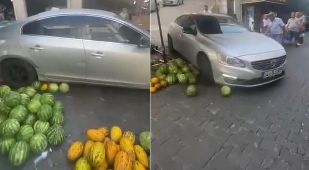 The luxury vehicle crushed the market vendor's labor.